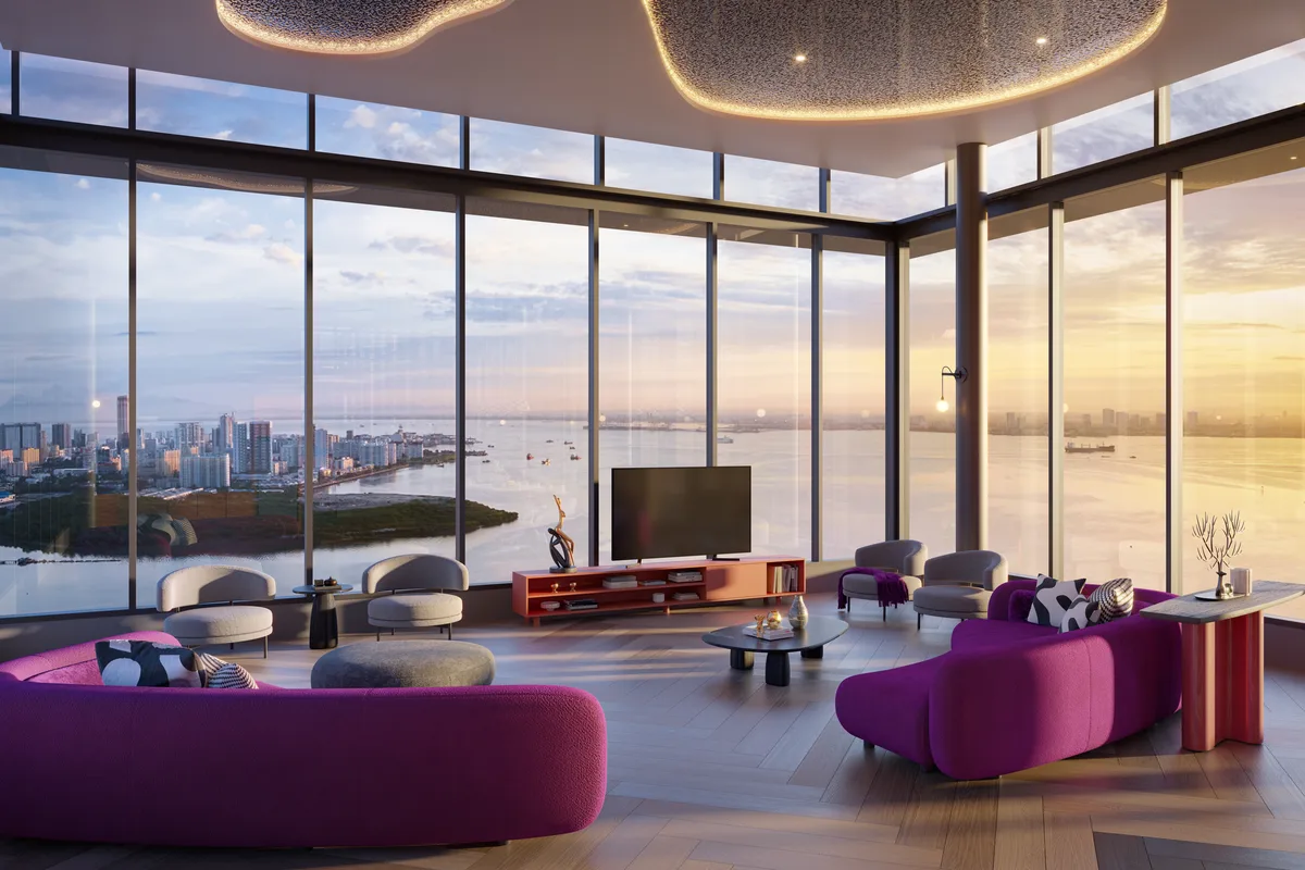 Living room at The Lighthauz with floor-to-ceiling windows over the Penang strait